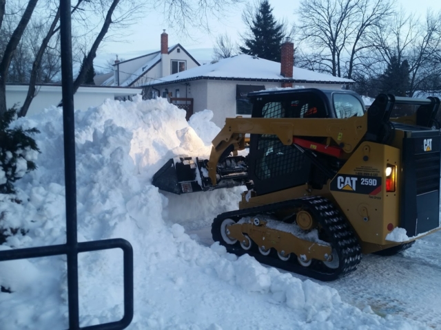 Residential Snow Removal Using a Skid Steer