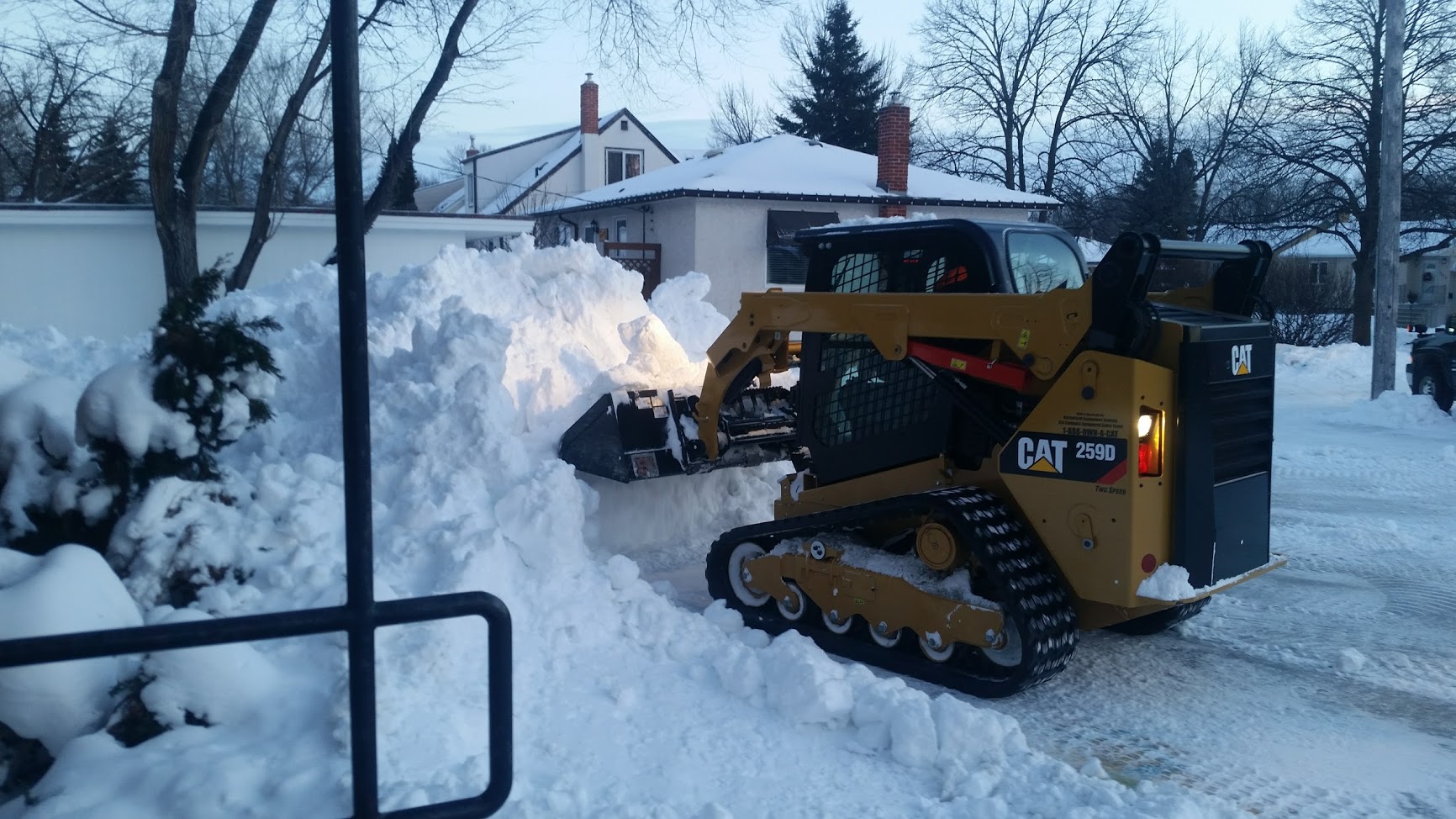 Residential Snow Removal Using a Skid Steer