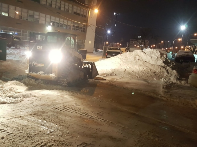 Removing Snow From Parking Area